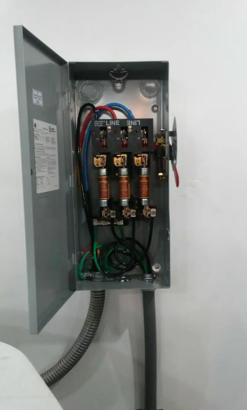 Three-phase disconnect switch installed for Smoke Detector Installation in Freeport